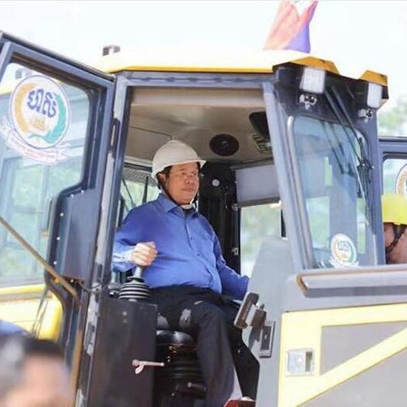 Cambodian Prime Minister Hun Sen Tests Shantui Bulldozer